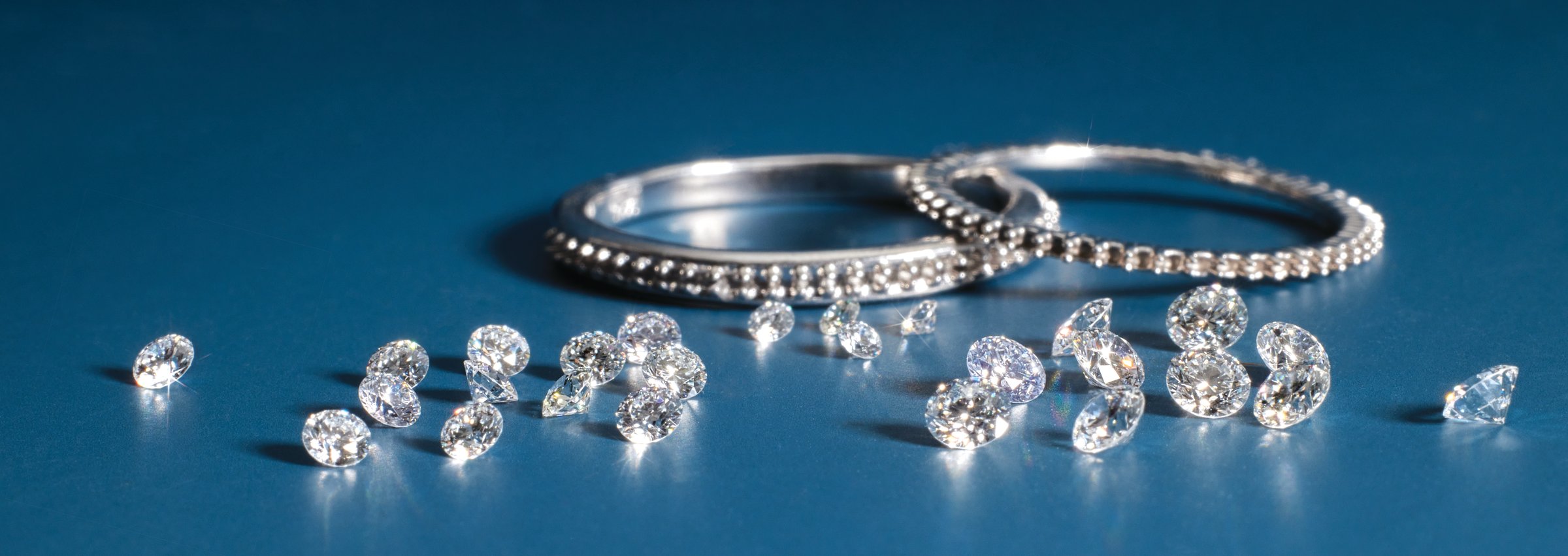 Faceted moissanite stones catching brilliant light